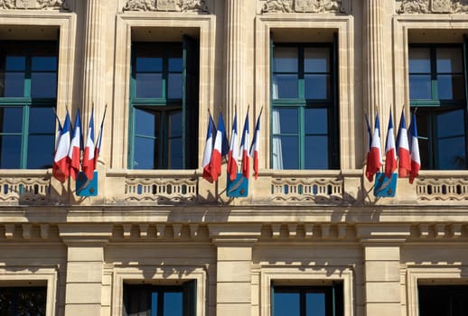 CANNES, FRANCE - MAY 6: Details of Hotel de Ville on May 6, 2013 in Cannes, France. It is located along the Croisette, and was built in 1884.

Cannes, France - May 6, 2013: Details of Hotel de Ville.  It is located along the Croisette, and was built in 1884.