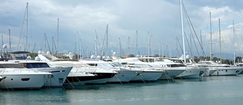 ANTIBES, FRANCE - MAY 6: Sailboats in Port Grimaldi on May 6, 2013 in Antibes, France.

Antibes, France - May 6, 2013: Sailboats in Port Grimaldi on the French Riviera.