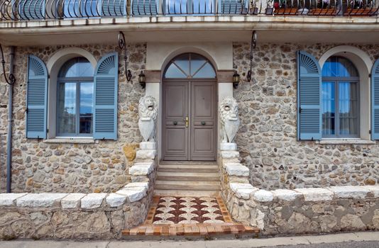 ANTIBES, FRANCE - MAY 6: Architecture of old town on May 6, 2013 in Antibes, France. City founded by the Romans in 42 BC.

Antibes, France - May 6, 2013: Architecture of old town in historical centre of Antibes, France. Antibes is a city located in the French Riviera. The city is also famous for its luxury shops, restaurants, and hotels. City founded by the Romans in 42 BC.