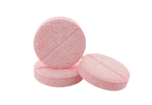 Close up of three rose pills on white background. Clipping path included.