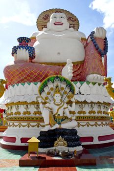 Smiling Big Buddha of wealth statue on Koh Samui, Thailand