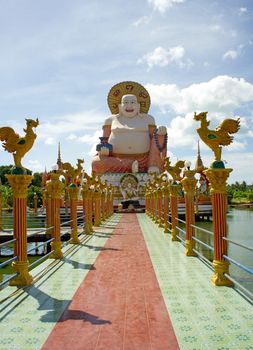 Smiling Buddha of wealth statue on Koh Samui, Thailand