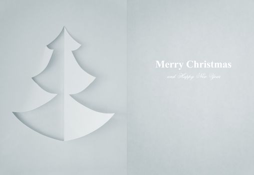 Greeting Card of christmas tree made of paper for your design