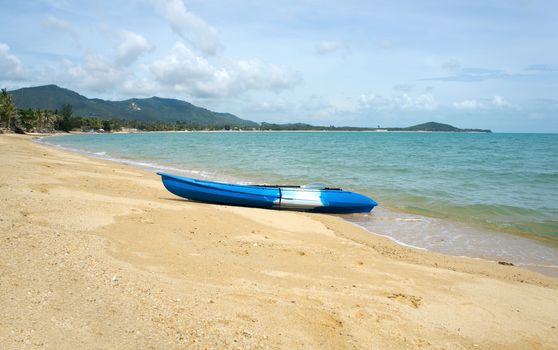 Blue kayak on a tropical beach, Koh Samui, Thailand