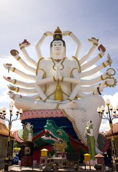 KOH SAMUI - AUGUST 14: Statue of Shiva, 18 armed buddha statue at wat plai laem temple August 14, 2012 in Koh Samui, Thailand. 