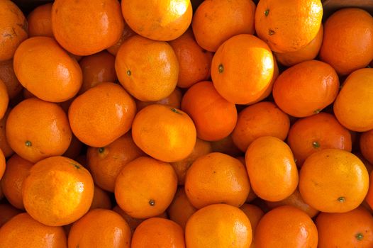 Backgrounds  of bunch of fresh oranges on market 
