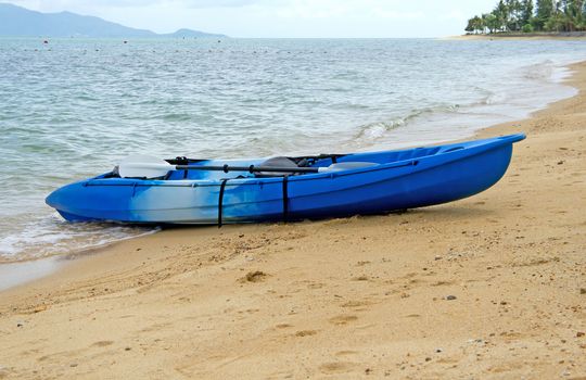 Blue kayak on a tropical beach, Koh Samui, Thailand