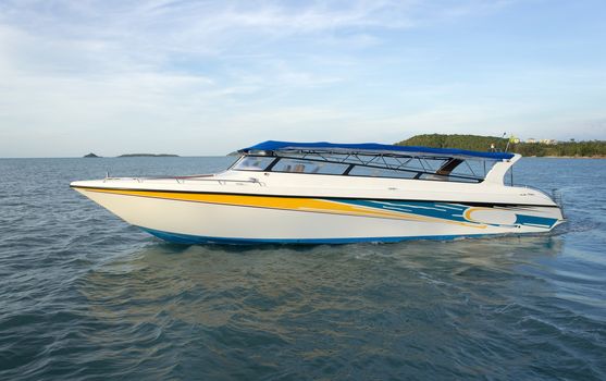 Boat - a speed boat on blue water