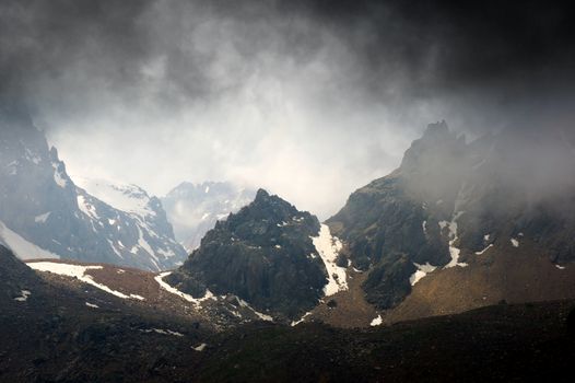 Storm clouds in the high mountains in Alps 