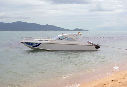 Speedboat anchored near beach in Koh Samui, Thailand.