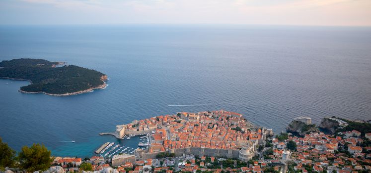 A view on the old city of Dubrovnik and Lokrum Island from above, in Dalmatia, Croatia