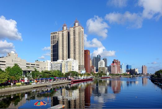 KAOHSIUNG, TAIWAN -- JUNE 17, 2015: Beautiful view of the Love River on a clear day with the lanes in the river marked out for the Dragon Boat Races.
