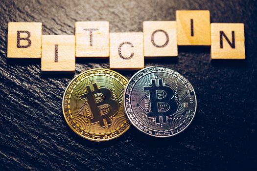 Bitcoin cryptocurrency (crypto currency). Silver Bitcoin and golden Bitcoin symbol. Bitcoin (BTC) cryptocurrency.