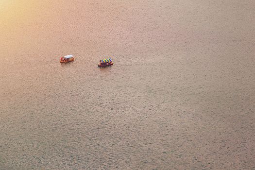 Lake Bled, Slovenia. Top view of a boat sailing in the lake. Bled lake is the most famous lake in Slovenia. Bled, Slovenia.