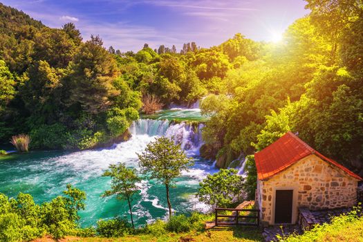Waterfalls Krka, National Park, Dalmatia, Croatia. View of Krka National Park, Roski Slap location, Croatia, Europe. Beautiful world of Mediterranean countries. Traveling concept background.