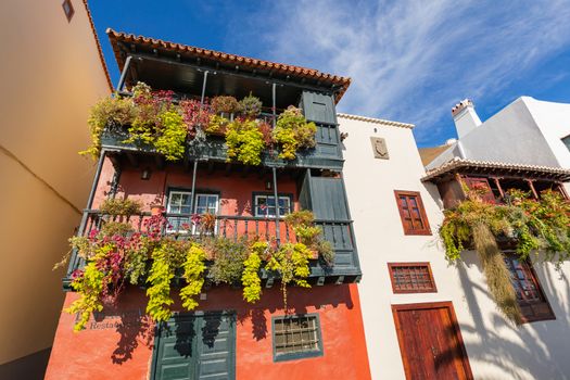 Famous ancient colorful balconies decorated with flowers in La Palma, Canary Islands, Spain.