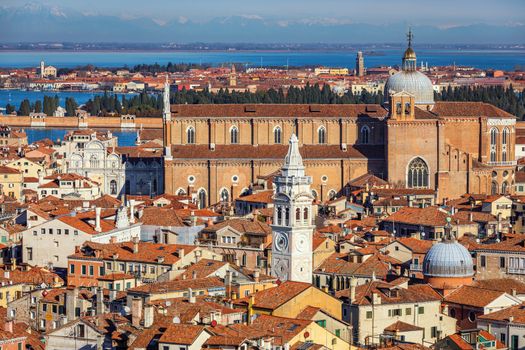 Venice panoramic aerial view with red roofs, Veneto, Italy. Aerial view of the Venice city, Italy. Venice is a popular tourist destination of Europe. Venice, Italy.