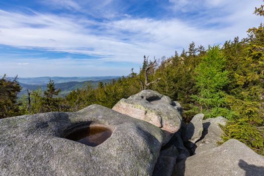 Rudawy Janowickie Landscape Park. Mountain range in Sudetes in Poland. View from Mala Ostra hill.