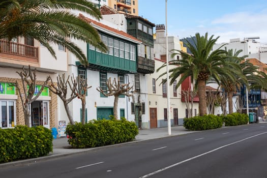 Famous ancient colorful balconies decorated with flowers. Santa Cruz - capital city of the island of La Palma, Canary Islands, Spain.