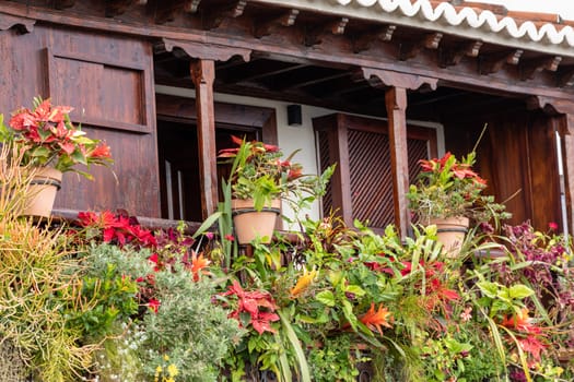 Famous ancient colorful balconies decorated with flowers. Santa Cruz - capital city of the island of La Palma, Canary Islands, Spain.