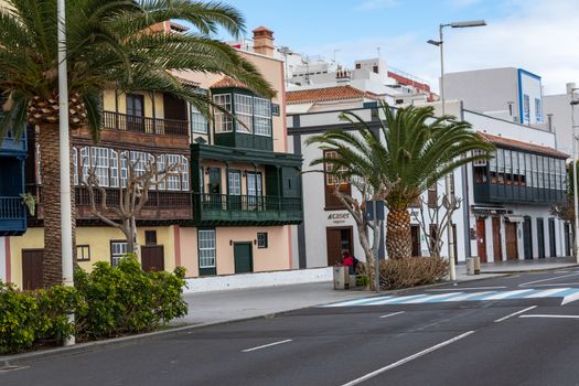 Famous ancient colorful balconies decorated with flowers. Santa Cruz - capital city of the island of La Palma, Canary Islands, Spain.