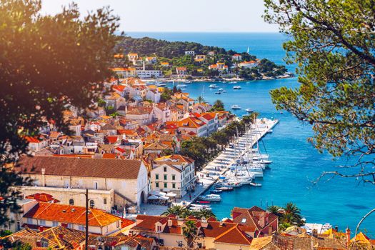 View at amazing archipelago with boats in front of town Hvar, Croatia. Harbor of old Adriatic island town Hvar. Popular touristic destination of Croatia. Amazing Hvar city on Hvar island, Croatia. 