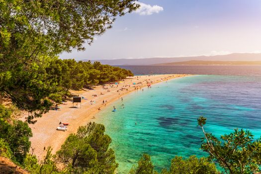 Zlatni Rat (Golden Cape or Golden Horn) famous turquoise beach in Bol town on Brac island, Dalmatia, Croatia. Zlatni Rat sandy beach at Bol on Brac island of Croatia in summertime.