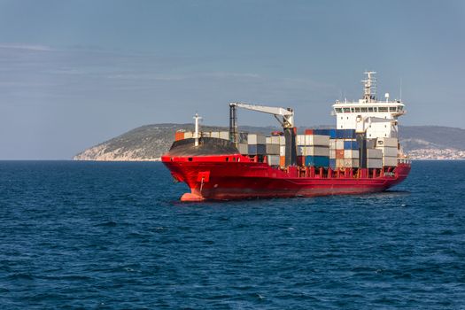 Logistics and transportation of International Container Cargo ship in the sea. International Container Cargo ship in the ocean, Freight Transportation, Shipping, Nautical Vessel.
