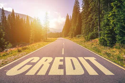 Credit word written on road in the mountains