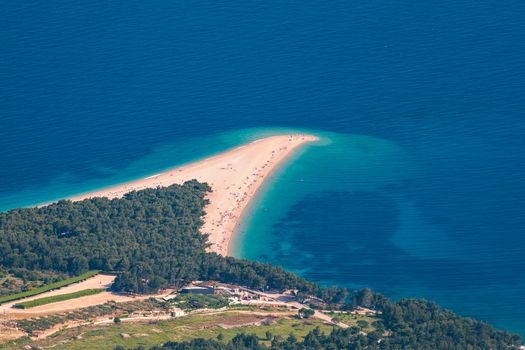 Zlatni Rat (Golden Cape or Golden Horn) famous turquoise beach in Bol town on Brac island, Dalmatia, Croatia. Zlatni Rat sandy beach at Bol on Brac island of Croatia in summertime.
