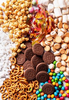 Sweet food. Top view of sweets, candies and cookies. Sweets background