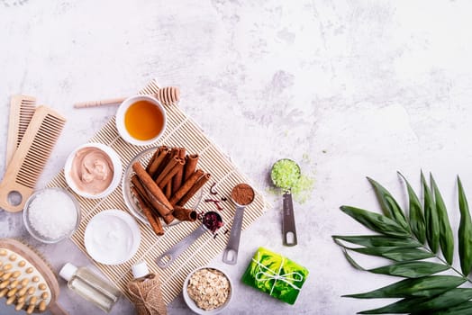 Natural cosmetics concepts. Beautiful spa setting with palm leaf top view flat lay