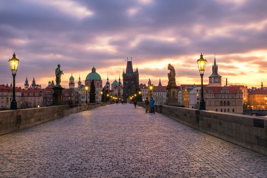 Morning view of Charles Bridge in Prague, Czech Republic. The Charles Bridge is one of the most visited sights in Prague. Architecture and landmark of Prague