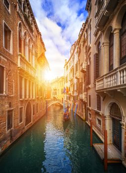 Canal with gondolas in Venice, Italy. Architecture and landmarks of Venice. Venice postcard with Venice gondolas.