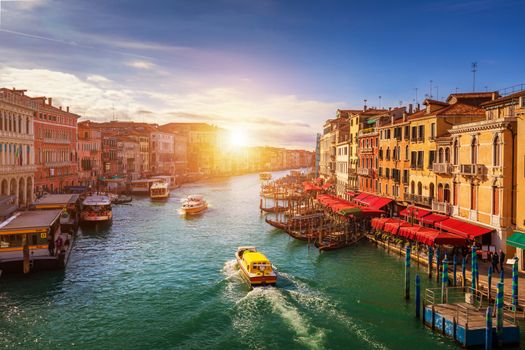 Grand Canal with gondolas in Venice, Italy. Sunset view of Venice Grand Canal. Architecture and landmarks of Venice. Venice postcard