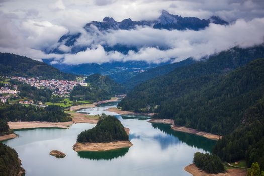 Panoramic view of lake of Centro Cadore in the Alps in Italy, Dolomites, near Belluno.