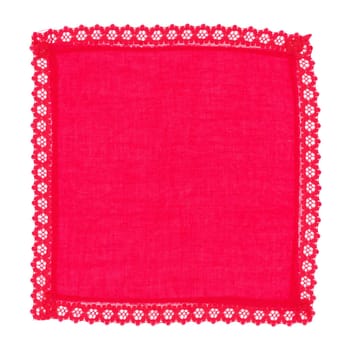 decorated ornamental doily in red fabric over white