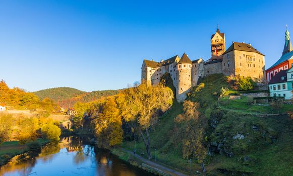 Colorful town Loket in autumn over Eger river in the Sokolov District in the Karlovy Vary region of the Czech Republic