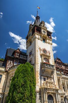 Peles Castle, Romania. Beautiful famous royal castle and ornamental garden in Sinaia landmark of Carpathian Mountains in Europe