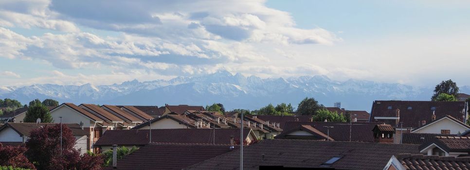 cloudy blue sky over a range of mountains