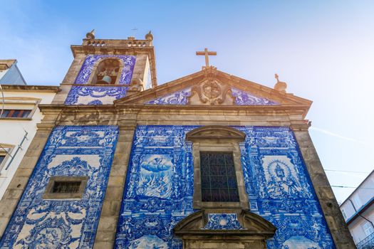 Traditional historic facade in Porto decorated with blue hand painted tin-glazed tiles, Oporto, Portugal