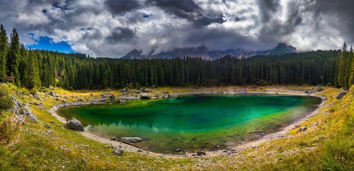 Karersee (Lago di Carezza), is a lake in the Dolomites in South Tyrol, Italy.
