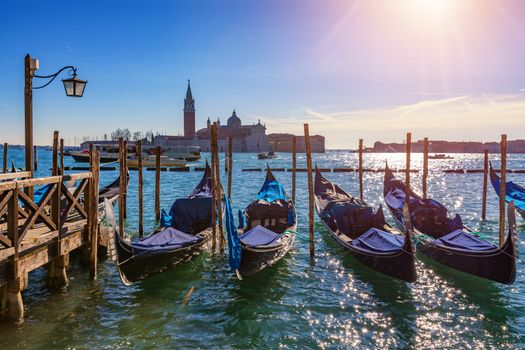 Sunny day in San Marco square, Venice, Italy. Venice Grand Canal. Architecture and landmarks of Venice. Venice postcard with Venice gondolas
