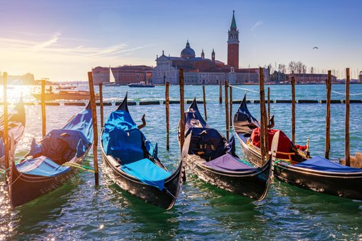 Sunny day in San Marco square, Venice, Italy. Venice Grand Canal. Architecture and landmarks of Venice. Venice postcard with Venice gondolas