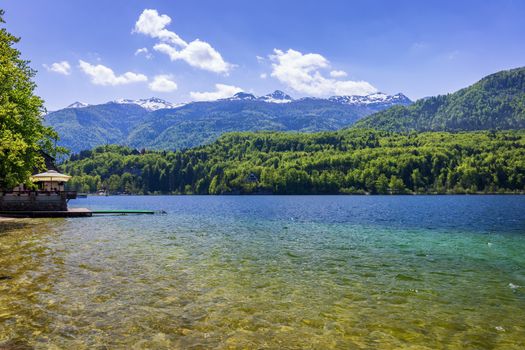 Lake Bohinj in Slovenia, beauty in nature. Colorful summer on the Bohinj lake in Triglav national park Slovenia, Alps, Europe. Mountain Lake bohinj in Julian Alps, Slovenia