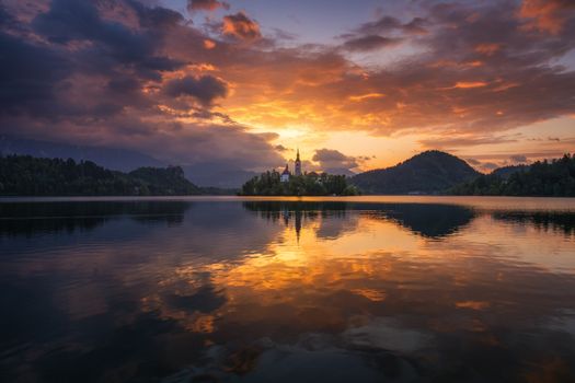 Lake Bled Slovenia. Beautiful mountain Bled lake with small Pilgrimage Church. Most famous Slovenian lake and island Bled with Pilgrimage Church of the Assumption of Maria. Bled, Slovenia.