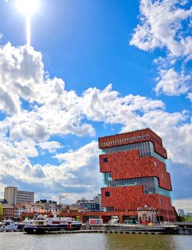 Antwerp, Belgium - April 26, 2019: Museum aan de Stroom (MAS) along the river Scheldt and the Port of Antwerp in Antwerp, Belgium.