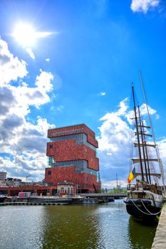 Antwerp, Belgium - April 26, 2019: Museum aan de Stroom (MAS) along the river Scheldt and the Port of Antwerp in Antwerp, Belgium.