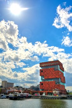 Antwerp, Belgium - April 26, 2019: Museum aan de Stroom (MAS) along the river Scheldt and the Port of Antwerp in Antwerp, Belgium.