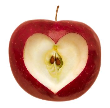 Red apple with a heart symbol isolated on white. Clipping path included.